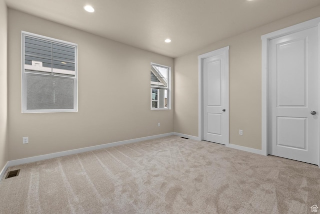 622 W Junegrass Ln, Stansbury Park, UT 84074 - unfurnished bedroom with light carpet