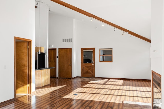 515 Saddle View Way Unit 23, Park City, UT 84060 - unfurnished living room featuring hardwood / wood-style floors, track lighting, and high vaulted ceiling