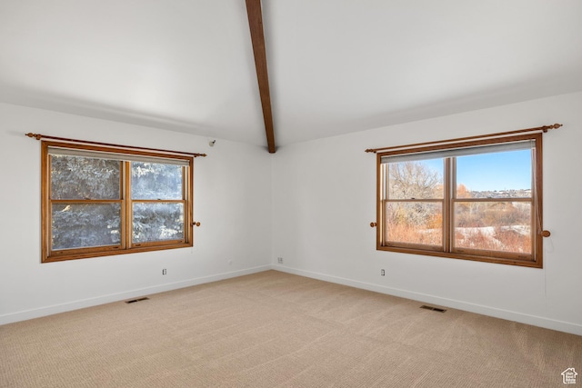 515 Saddle View Way Unit 23, Park City, UT 84060 - spare room with lofted ceiling with beams, light colored carpet, and a healthy amount of sunlight