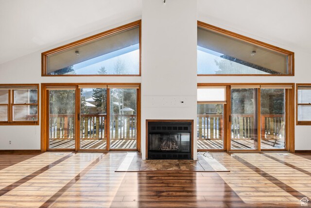 515 Saddle View Way Unit 23, Park City, UT 84060 - unfurnished living room featuring hardwood / wood-style flooring and high vaulted ceiling