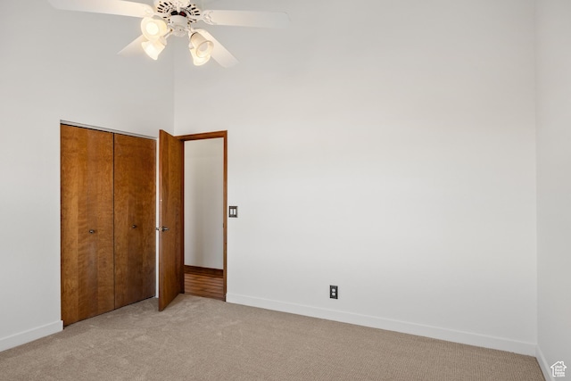 515 Saddle View Way Unit 23, Park City, UT 84060 - unfurnished bedroom with ceiling fan, a closet, and light carpet