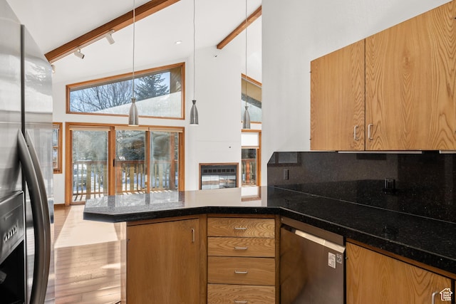 515 Saddle View Way Unit 23, Park City, UT 84060 - kitchen featuring beamed ceiling, high vaulted ceiling, black fridge with ice dispenser, and kitchen peninsula
