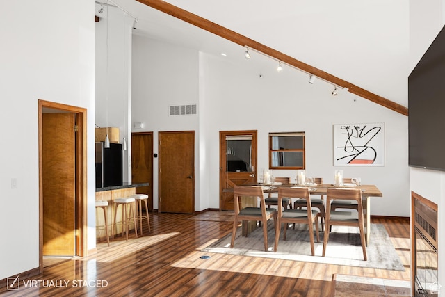 515 Saddle View Way Unit 23, Park City, UT 84060 - dining space featuring wood-type flooring, high vaulted ceiling, and rail lighting