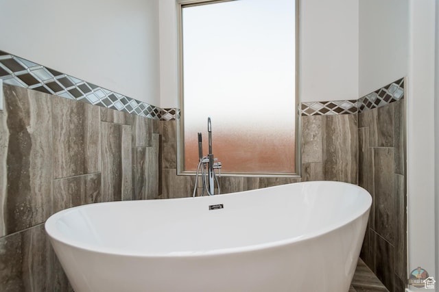 378 W Redstone Ct, Ivins, UT 84738 - full bath featuring a freestanding bath, a sink, and tile walls