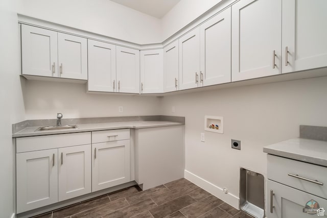 378 W Redstone Ct, Ivins, UT 84738 - clothes washing area featuring cabinet space, wood tiled floor, hookup for an electric dryer, washer hookup, and a sink