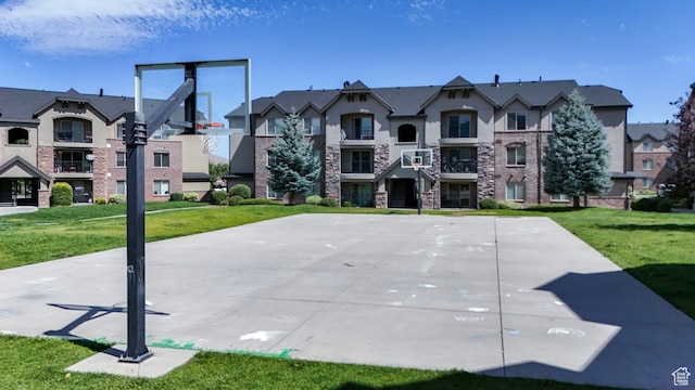 1045 S 1700 W Unit 412, Payson, UT 84651 - view of basketball court with community basketball court, a yard, and a residential view