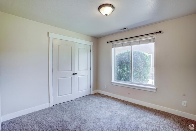 1045 S 1700 W Unit 412, Payson, UT 84651 - unfurnished bedroom featuring carpet floors and a closet