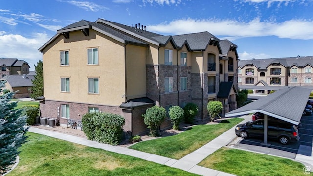 1045 S 1700 W Unit 412, Payson, UT 84651 - view of building exterior with a residential view