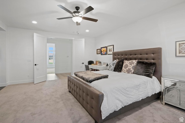 carpeted bedroom with ceiling fan