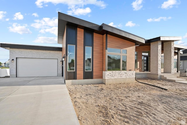 modern home featuring a garage