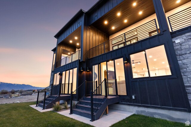 68 E Watson Dr S, Saratoga Springs, UT 84045 - exterior space featuring a mountain view, a lawn, and a balcony
