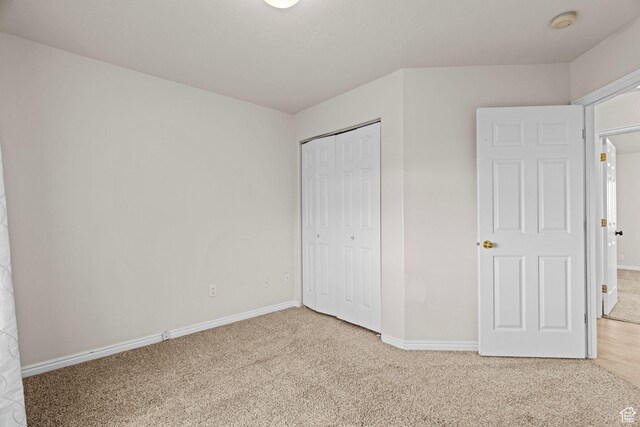 3561 W 290 N, Hurricane, UT 84737 - unfurnished bedroom featuring a closet and carpet