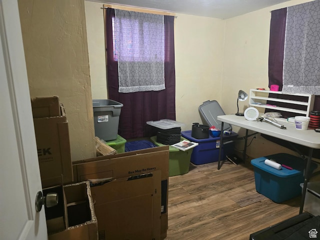 office space with wood finished floors