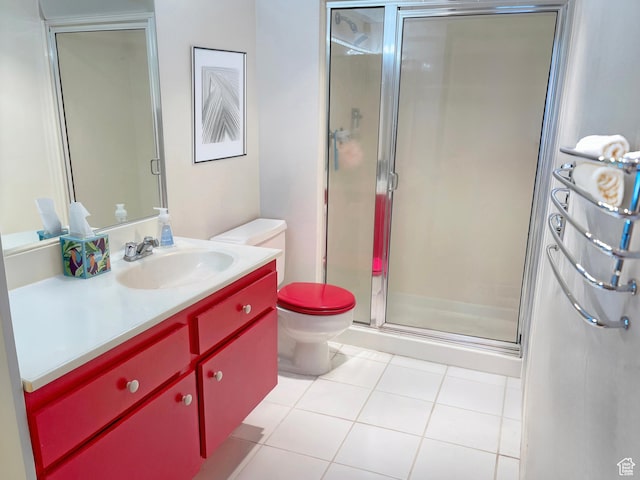 bathroom featuring vanity, toilet, an enclosed shower, and tile patterned flooring