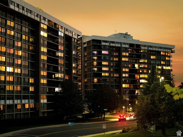 view of outdoor building at dusk