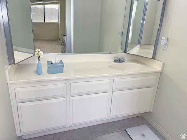 bathroom with vanity and tile patterned floors