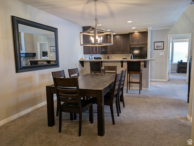 798 N 800 W Unit 8, Midway, UT 84049 - dining room featuring light colored carpet and a chandelier
