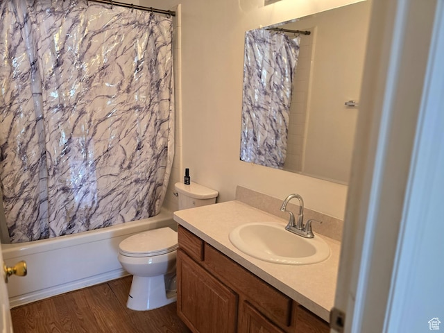 1305 Monroe Blvd Unit 15, Ogden, UT 84404 - full bathroom featuring shower / bath combination with curtain, vanity, wood finished floors, and toilet