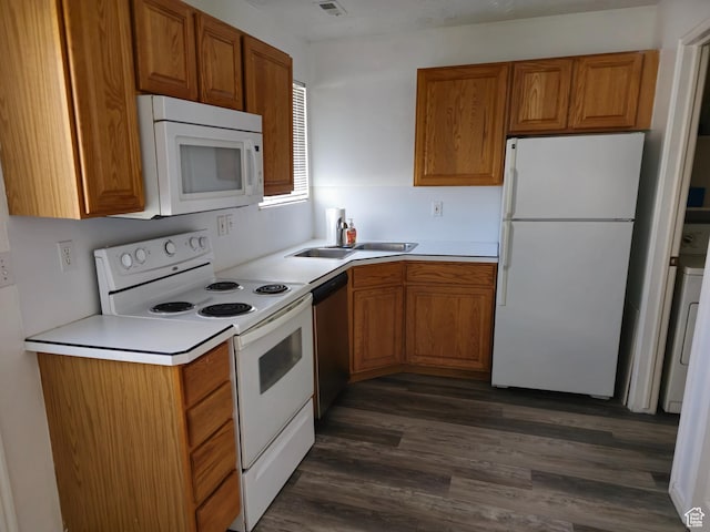 1305 Monroe Blvd Unit 15, Ogden, UT 84404 - kitchen with white appliances, brown cabinets, dark wood-style flooring, light countertops, and a sink
