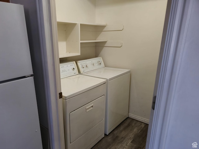 1305 Monroe Blvd Unit 15, Ogden, UT 84404 - clothes washing area with laundry area, baseboards, dark wood finished floors, and washer and dryer
