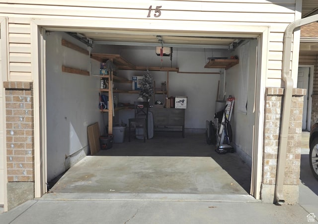 1305 Monroe Blvd Unit 15, Ogden, UT 84404 - garage featuring a garage door opener