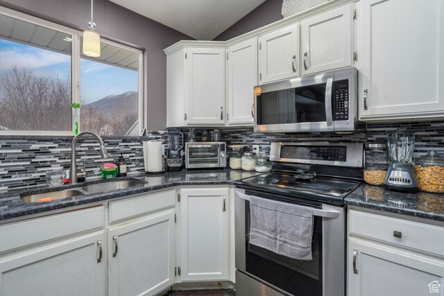 806 W 550 N, Pleasant Grove, UT 84062 - kitchen with sink, stainless steel appliances, and white cabinets
