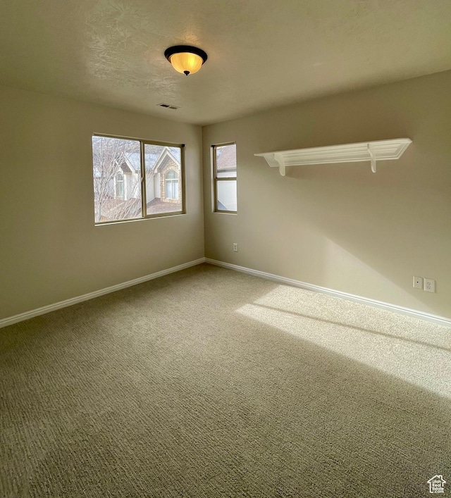 909 E Rosebud Ct, Draper, UT 84020 - unfurnished room with carpet flooring and a textured ceiling