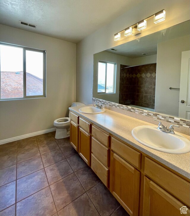 909 E Rosebud Ct, Draper, UT 84020 - bathroom with tile patterned flooring, vanity, and toilet