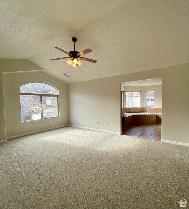909 E Rosebud Ct, Draper, UT 84020 - carpeted spare room with lofted ceiling, a textured ceiling, and ceiling fan