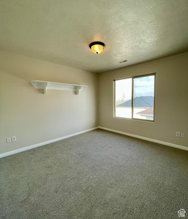909 E Rosebud Ct, Draper, UT 84020 - carpeted empty room with a textured ceiling