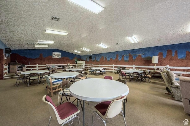 1150 W Red Hills Pkwy Unit 72, Washington, UT 84780 - dining space featuring carpet, lofted ceiling, a textured ceiling, and visible vents