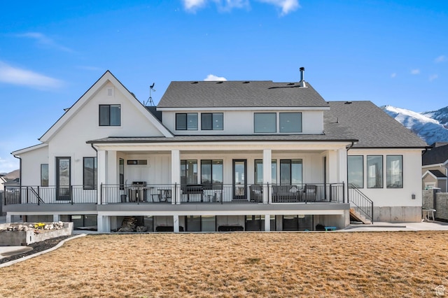1426 S 1450 W, Mapleton, UT 84664 - rear view of house with a shingled roof and a mountain view
