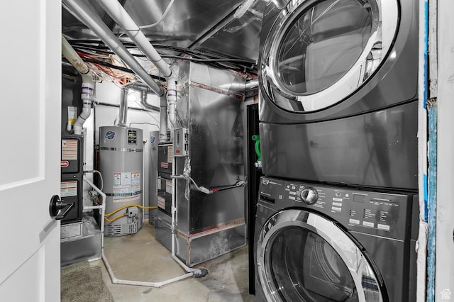 1426 S 1450 W, Mapleton, UT 84664 - clothes washing area with laundry area, secured water heater, stacked washer and clothes dryer, and heating unit