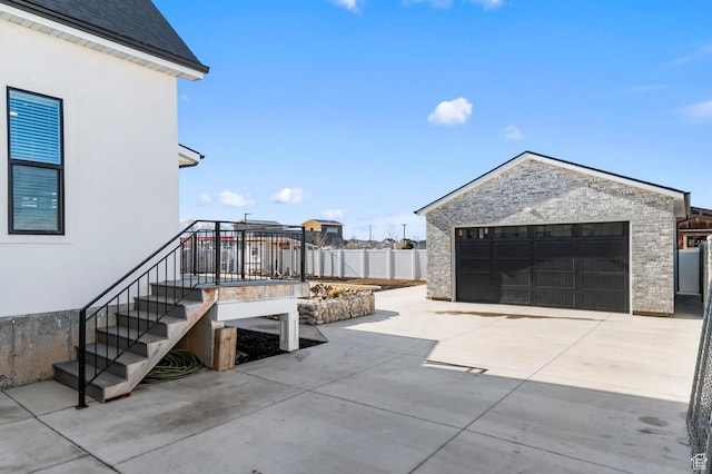 1426 S 1450 W, Mapleton, UT 84664 - view of patio / terrace featuring a detached garage, fence, and an outdoor structure