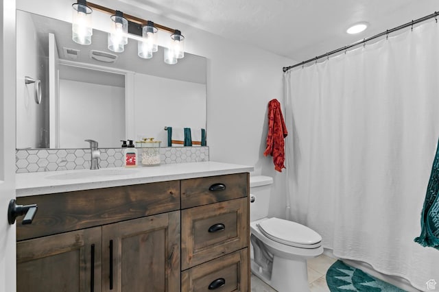 1426 S 1450 W, Mapleton, UT 84664 - full bathroom with visible vents, decorative backsplash, toilet, tile patterned flooring, and vanity
