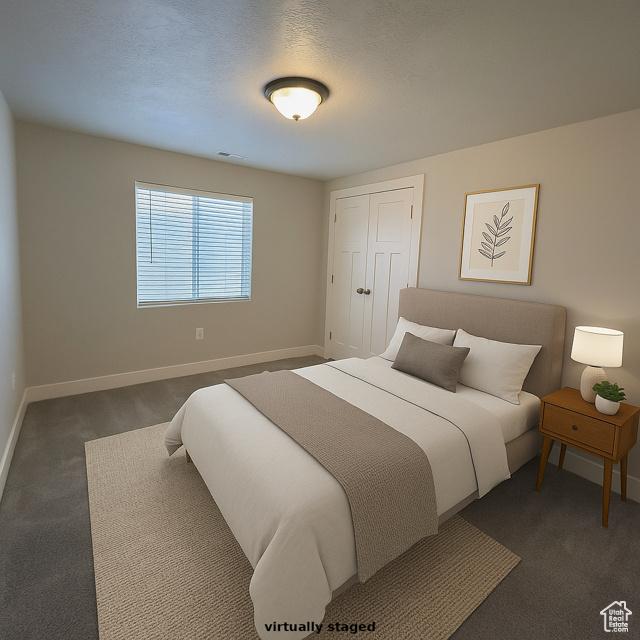 545 E Petersen Pkwy, South Weber, UT 84405 - bedroom with baseboards and dark carpet