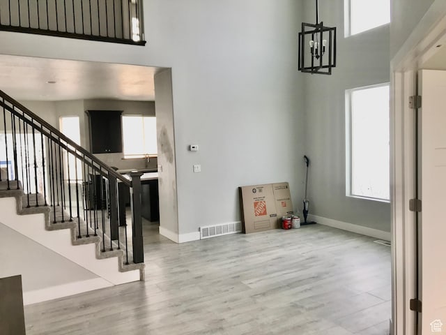 545 E Petersen Pkwy, South Weber, UT 84405 - foyer entrance with baseboards, visible vents, and wood finished floors