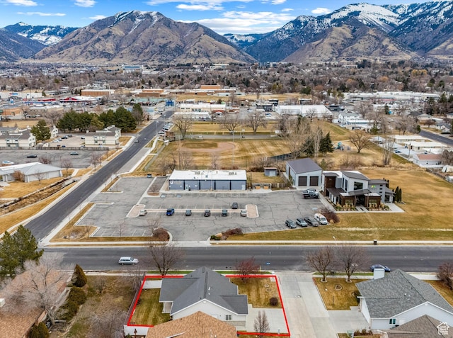 drone / aerial view featuring a mountain view