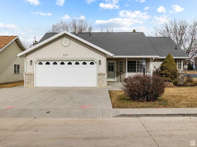ranch-style home featuring a garage