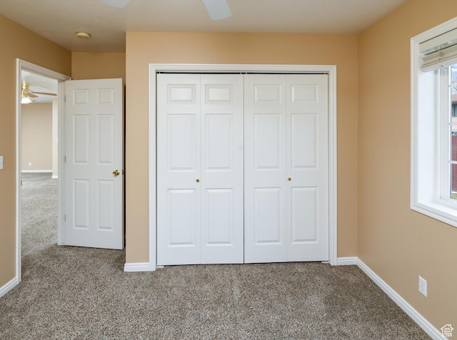 unfurnished bedroom featuring a closet and carpet