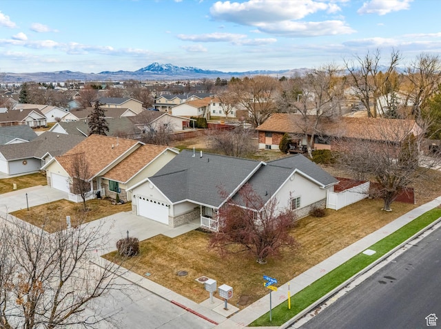 drone / aerial view featuring a mountain view