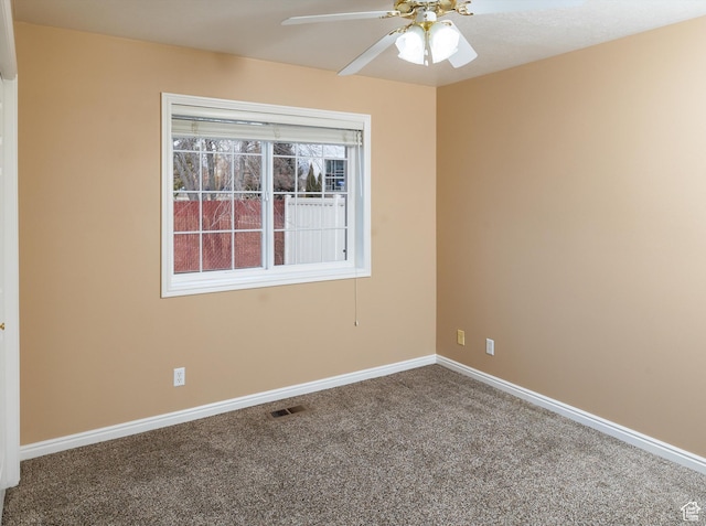 unfurnished room with carpet flooring and ceiling fan