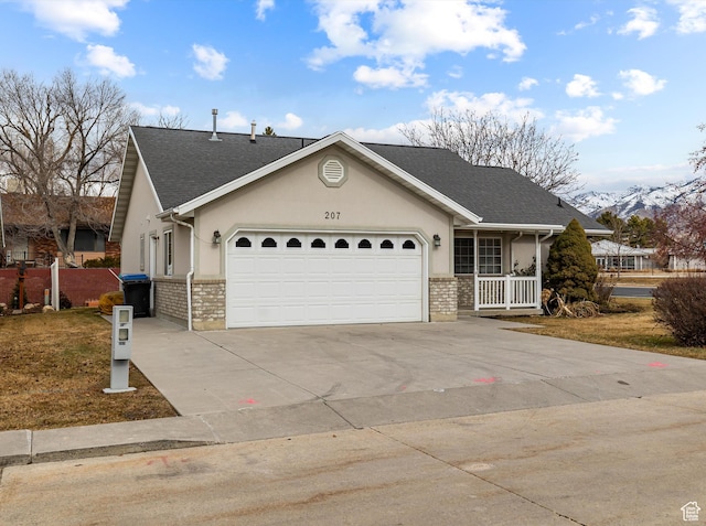 view of front facade featuring a garage and a porch