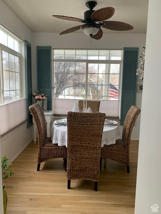 14139 S Radial Ln, Draper, UT 84020 - dining room with light wood-type flooring, a ceiling fan, and baseboards