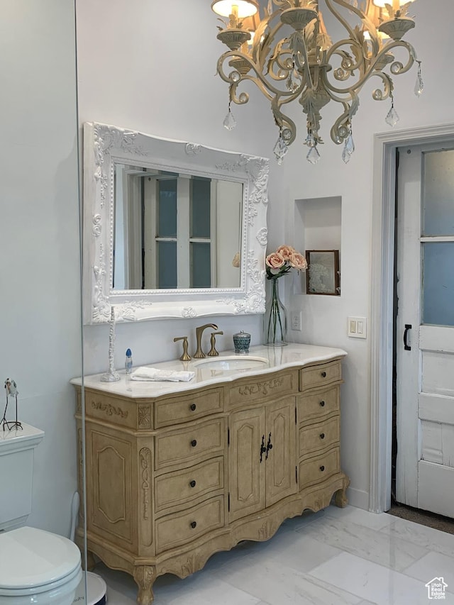 14139 S Radial Ln, Draper, UT 84020 - bathroom featuring vanity, toilet, a chandelier, and marble finish floors