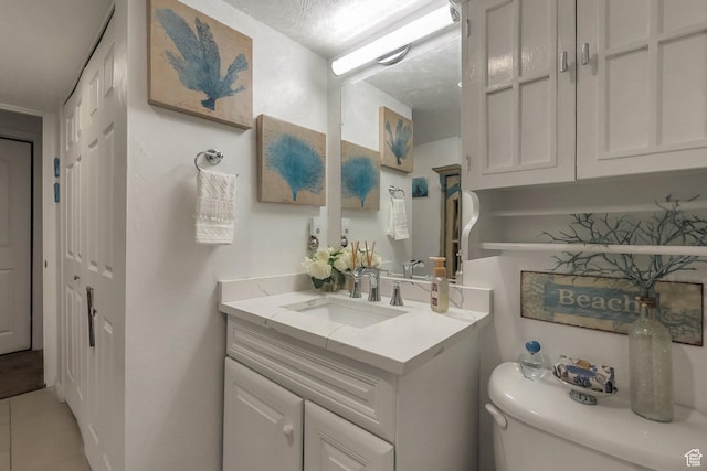 14139 S Radial Ln, Draper, UT 84020 - half bath with vanity, toilet, and tile patterned floors