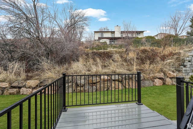 deck featuring a yard