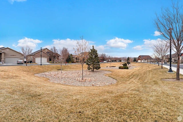 10743 S Autumn Wind Way S, Jordan, UT 84009 - view of yard with a garage