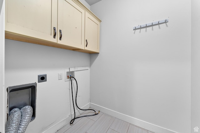 10743 S Autumn Wind Way S, Jordan, UT 84009 - clothes washing area featuring cabinets, electric dryer hookup, and washer hookup