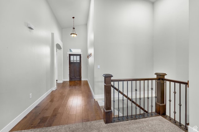 10743 S Autumn Wind Way S, Jordan, UT 84009 - hall with high vaulted ceiling and dark hardwood / wood-style flooring